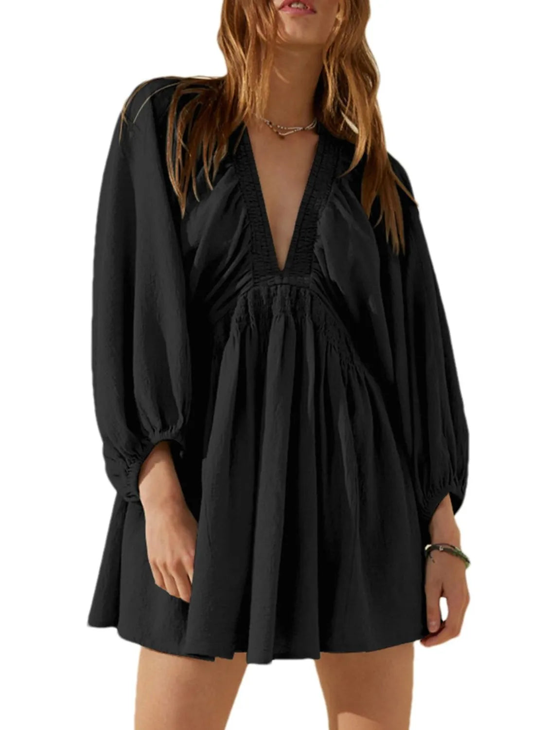 CM | Minivestido texturizado con escote en V