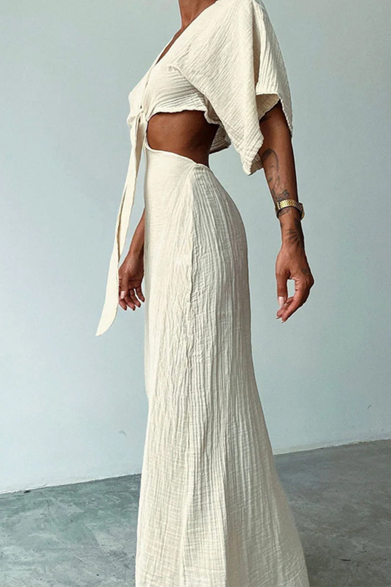 CM | Vestido largo con recortes y nudo central