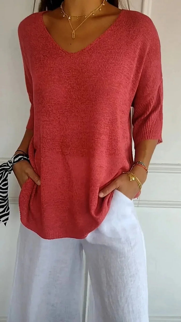 CM | Cómoda blusa con escote en V y corte holgado. Blusa informal y holgada con mangas de longitud media.