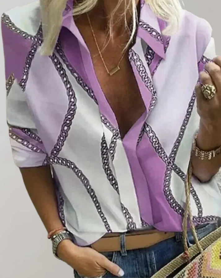 CM | Elegante blusa con estampado de cadenas y escote en V