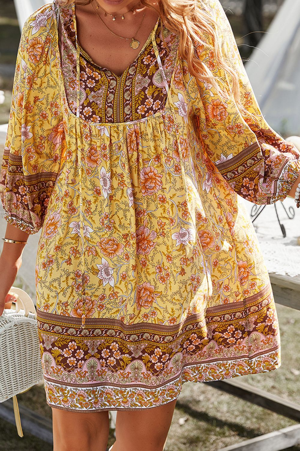 CM | Devine Minivestido estampado con escote anudado