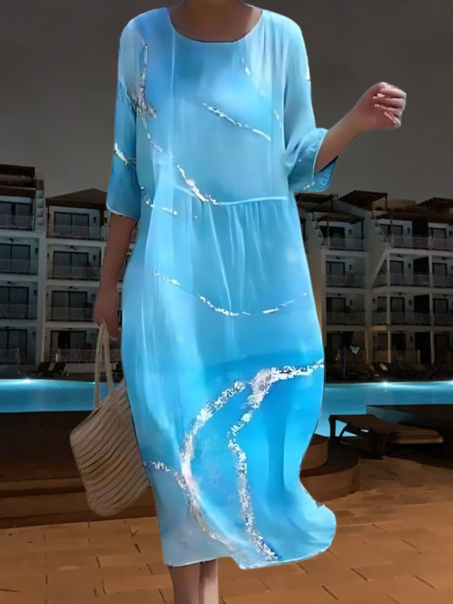 CM | Elegante vestido midi de material ligero y fluido, manga 3/4 con estampado floral