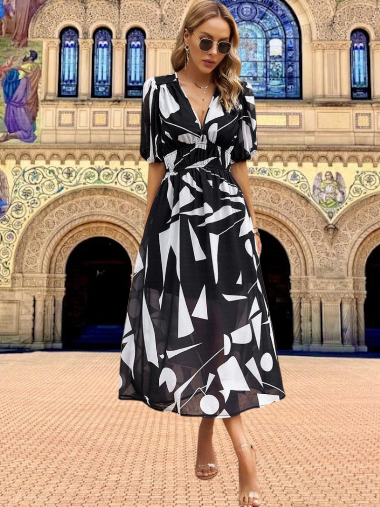 CM | Vestido midi floral con mangas abullonadas