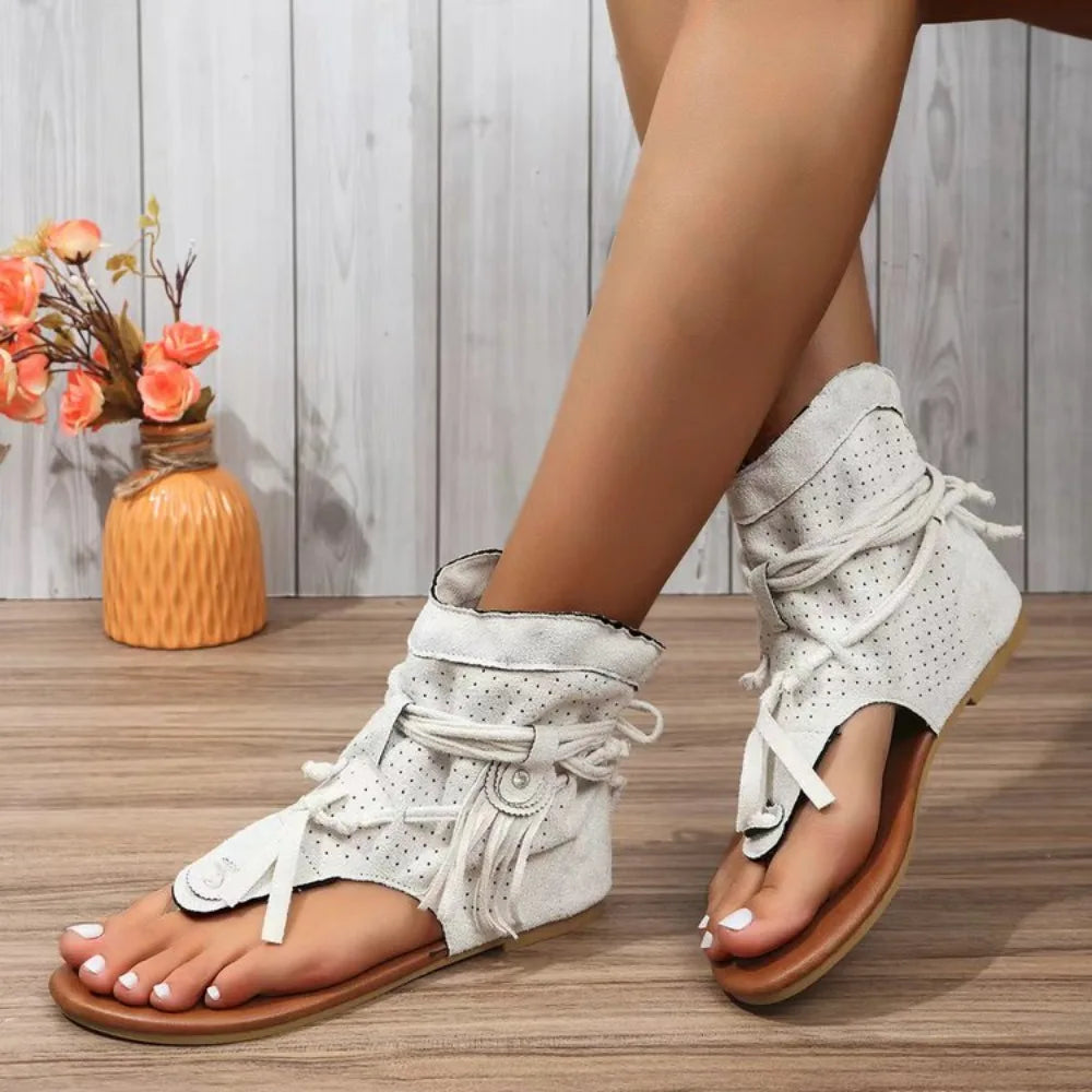 CM | Sandalias con detalle de flecos