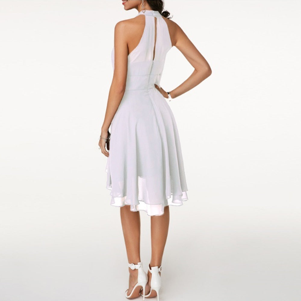 CM | Vestido corto con cuello alto y volantes