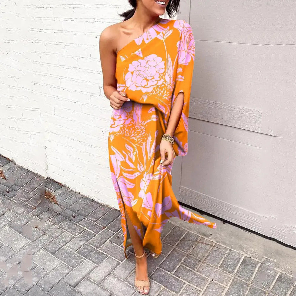 CM | Vestido largo asimétrico con estampado floral