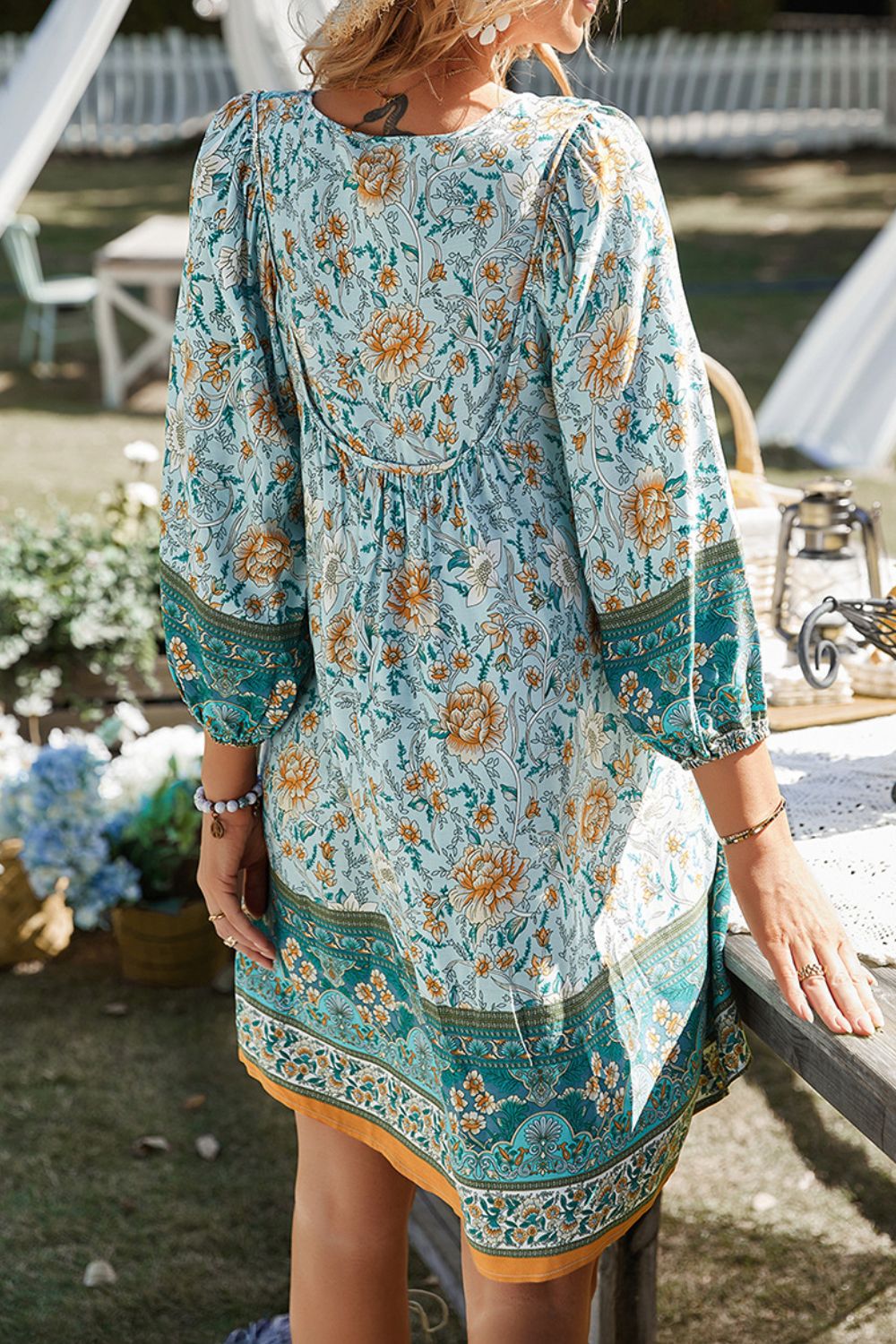 CM | Devine Minivestido estampado con escote anudado