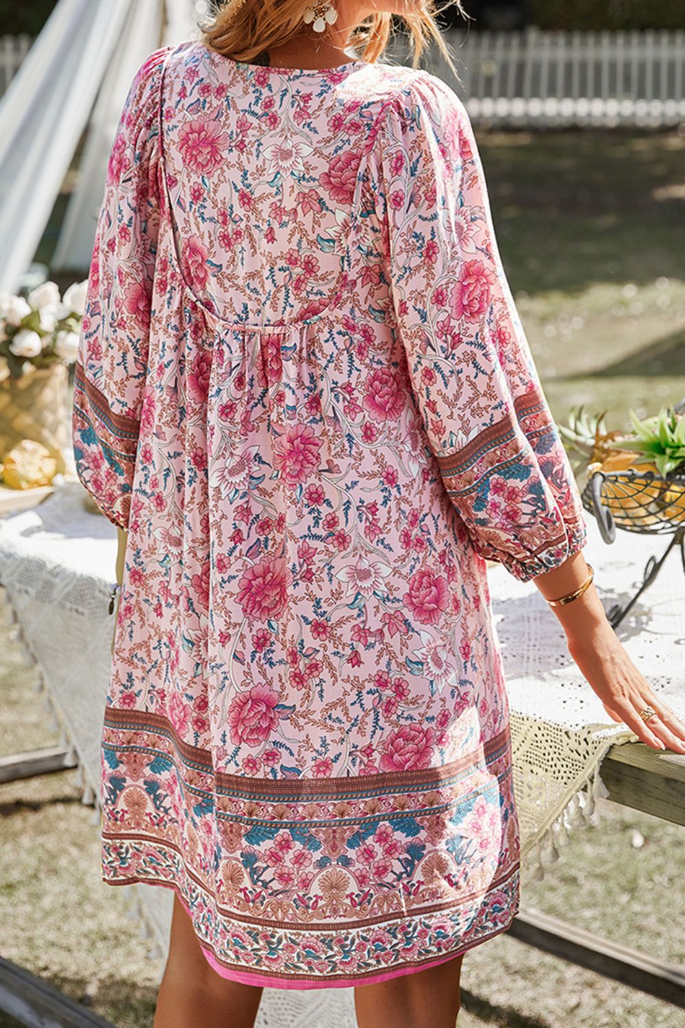 CM | Devine Minivestido estampado con escote anudado