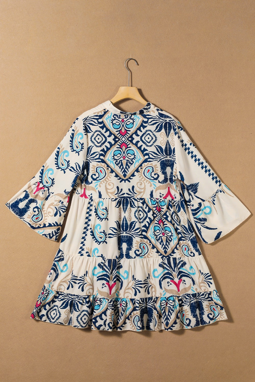 CM | Minivestido estampado con mangas tres cuartos y recortes