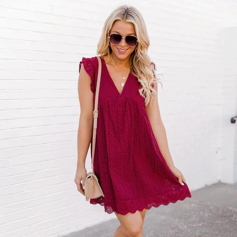 CM | Delicado mini vestido con ojales