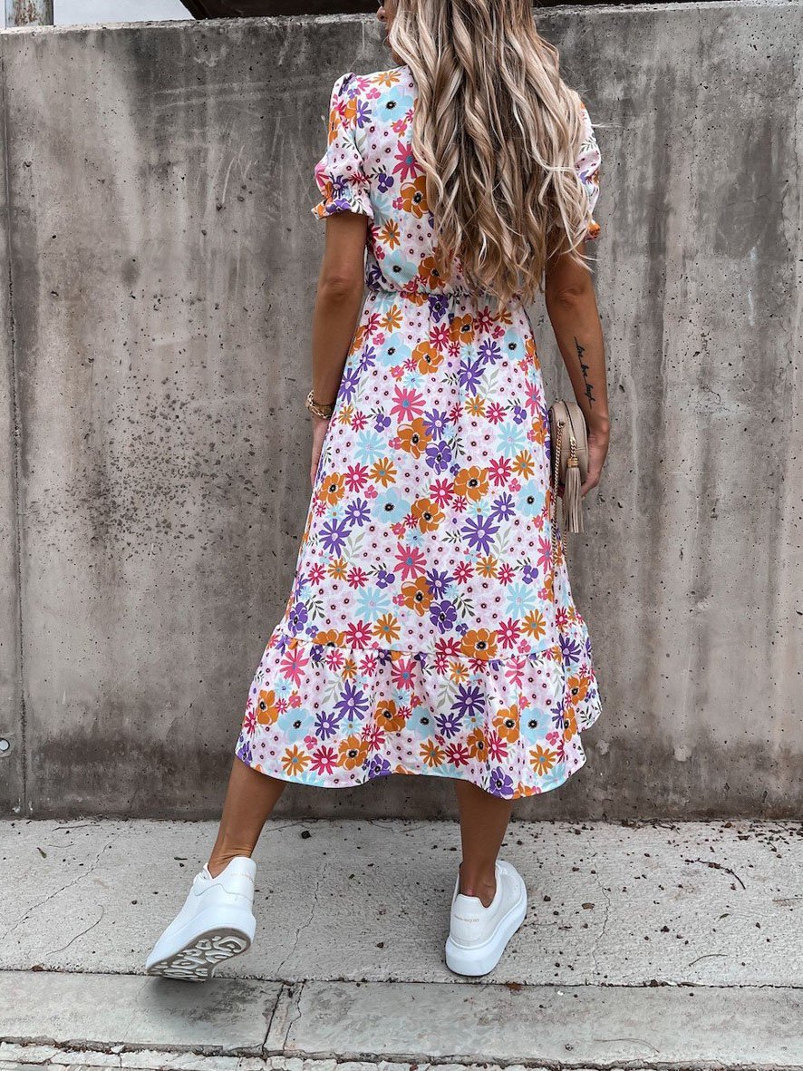 CM | Vestido largo con escote en V y estampado partido