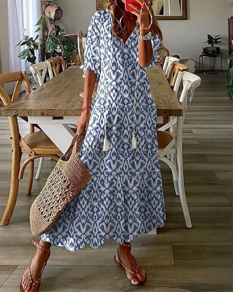 CM | Maxi vestido con escote en V y estampado