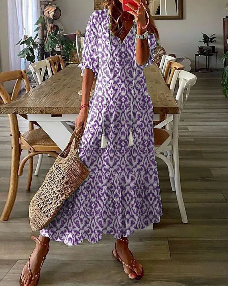 CM | Maxi vestido con escote en V y estampado