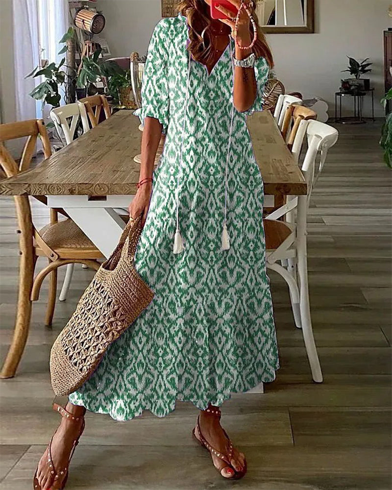 CM | Maxi vestido con escote en V y estampado