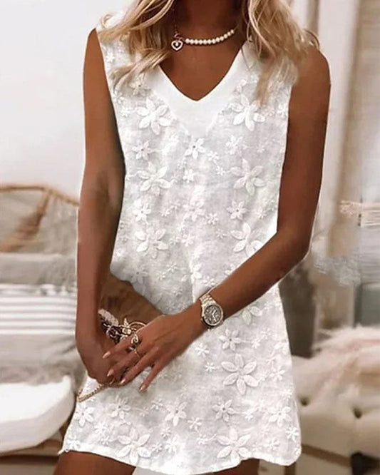 CM | Mini vestido con apliques florales