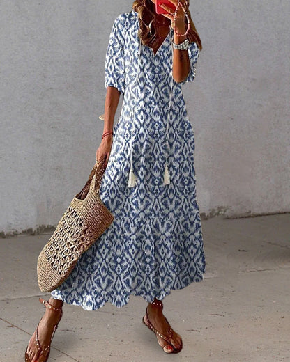 CM | Maxi vestido con escote en V y estampado