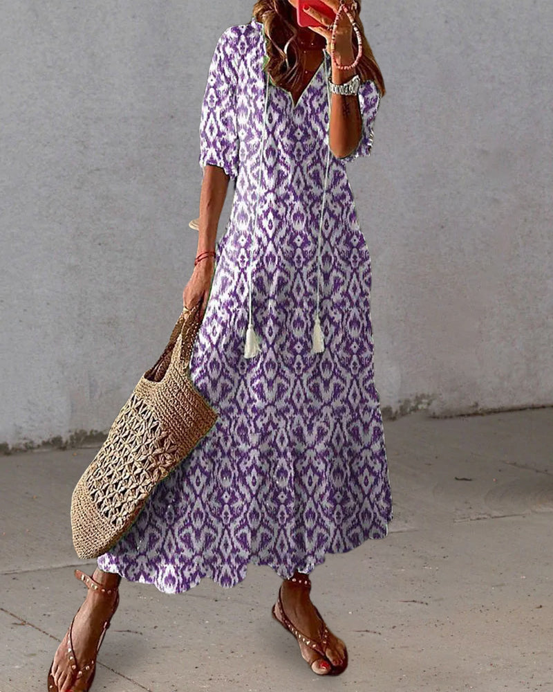 CM | Maxi vestido con escote en V y estampado