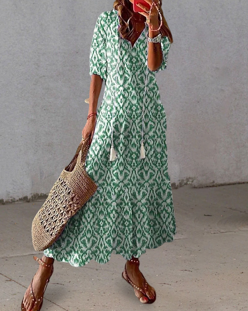 CM | Maxi vestido con escote en V y estampado