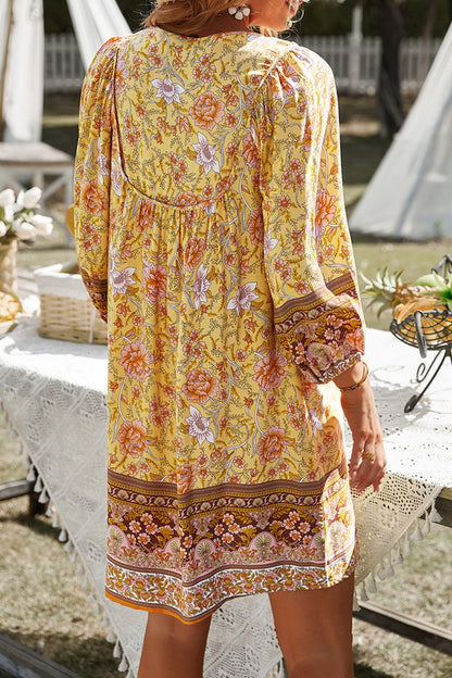 CM | Devine Minivestido estampado con escote anudado
