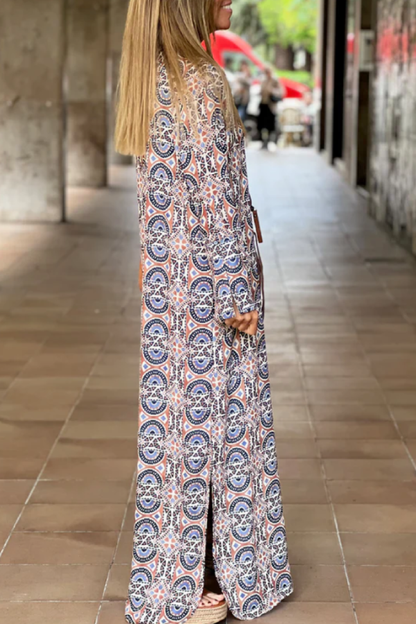 CM | Vestido largo con cuello en V y abertura estampada