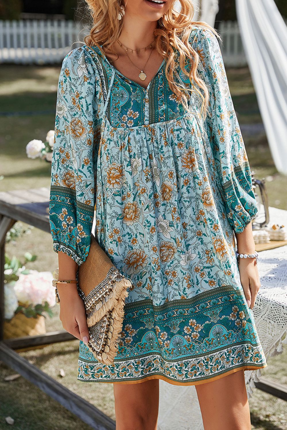 CM | Devine Minivestido estampado con escote anudado