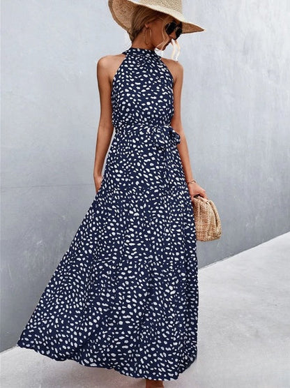 CM | Vestido mono de tirantes y escote halterneck con estampado de lunares ondulados