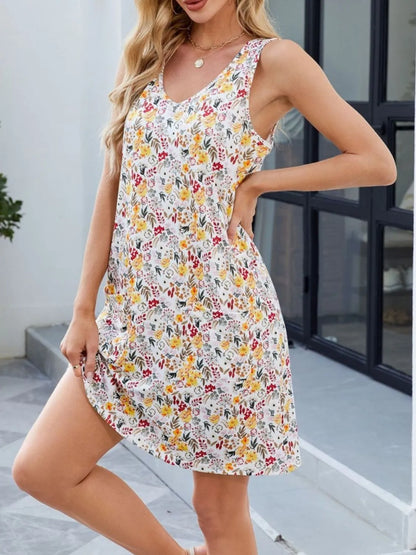 CM | Mini vestido estampado sin mangas con cuello en V y bolsillos