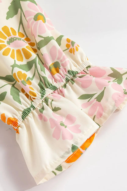 CM | Minivestido estampado con mangas de muesca y volantes