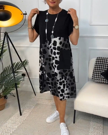CM | Elegante vestido midi de manga corta con estampado de leopardo