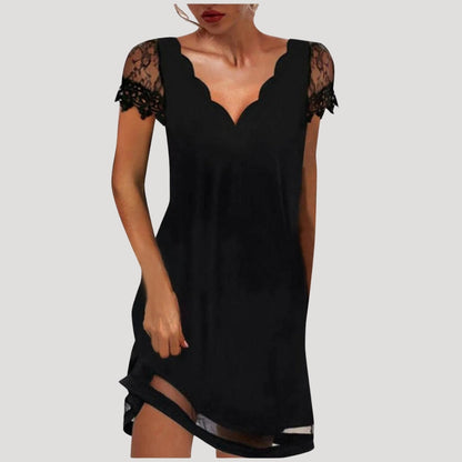 CM | Minivestido negro de mujer con mangas cortas de encaje