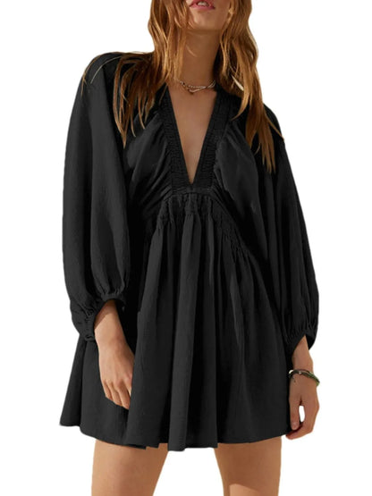 CM | Minivestido texturizado con escote en V