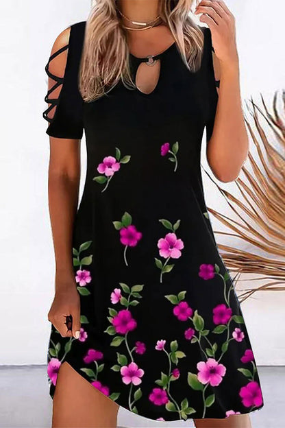 CM | Vestido corto con recortes y estampado de hojas
