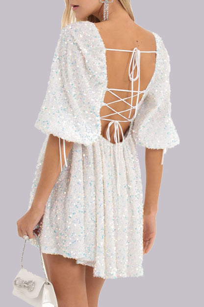 CM | Mini vestido lentejuelas mangas abullonadas