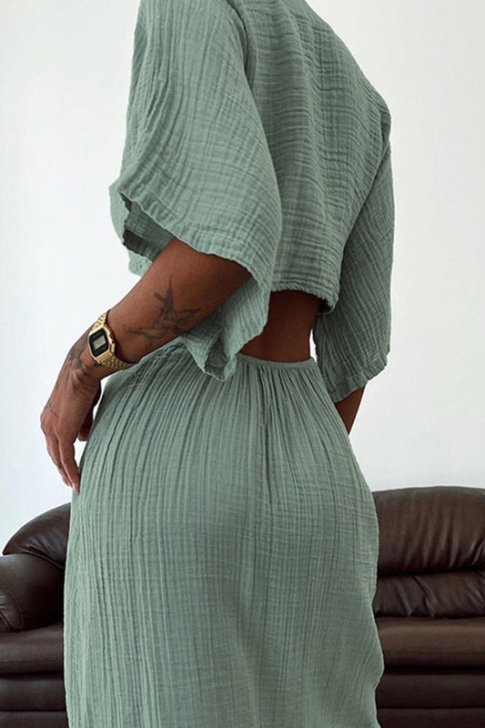 CM | Vestido largo con recortes y nudo central