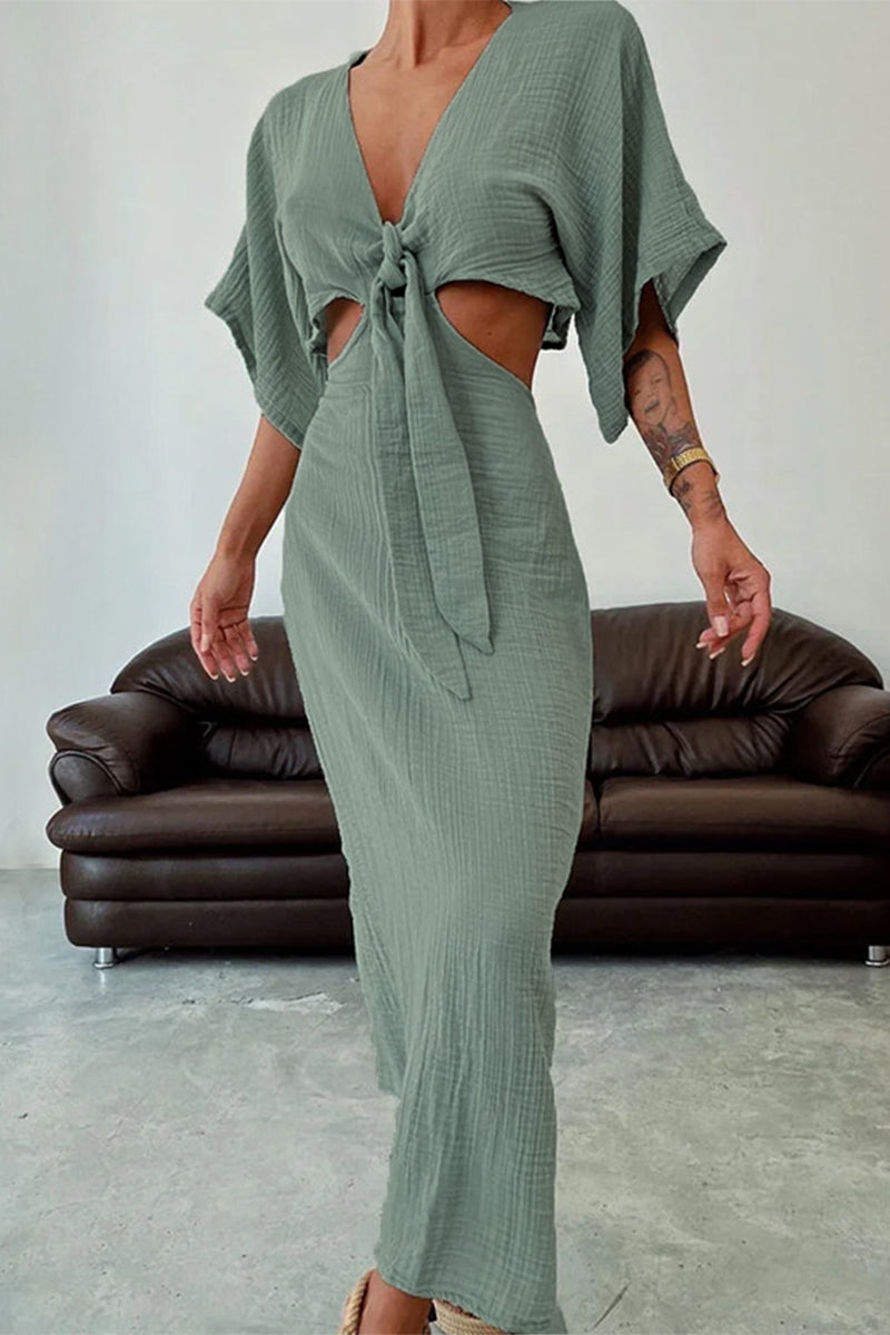 CM | Vestido largo con recortes y nudo central