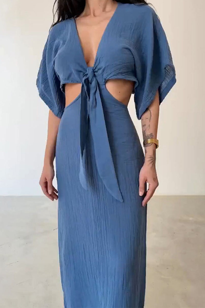 CM | Vestido largo con recortes y nudo central