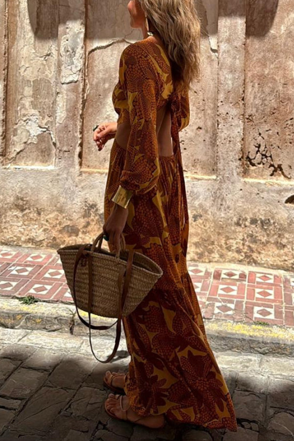 CM | Vestido maxi de manga larga con escote en pico y estampado de girasoles