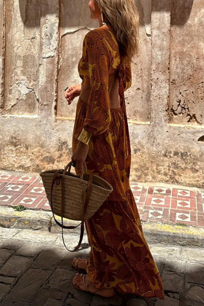 CM | Vestido maxi de manga larga con escote en pico y estampado de girasoles
