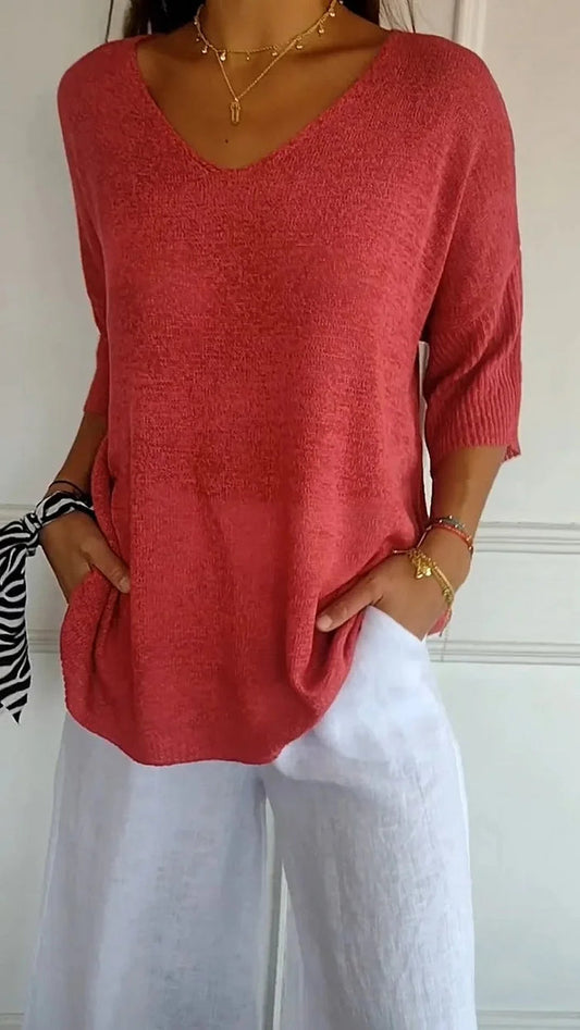CM | Cómoda blusa con escote en V y corte holgado. Blusa informal y holgada con mangas de longitud media.