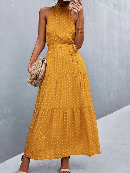 CM | Vestido mono de tirantes y escote halterneck con estampado de lunares ondulados