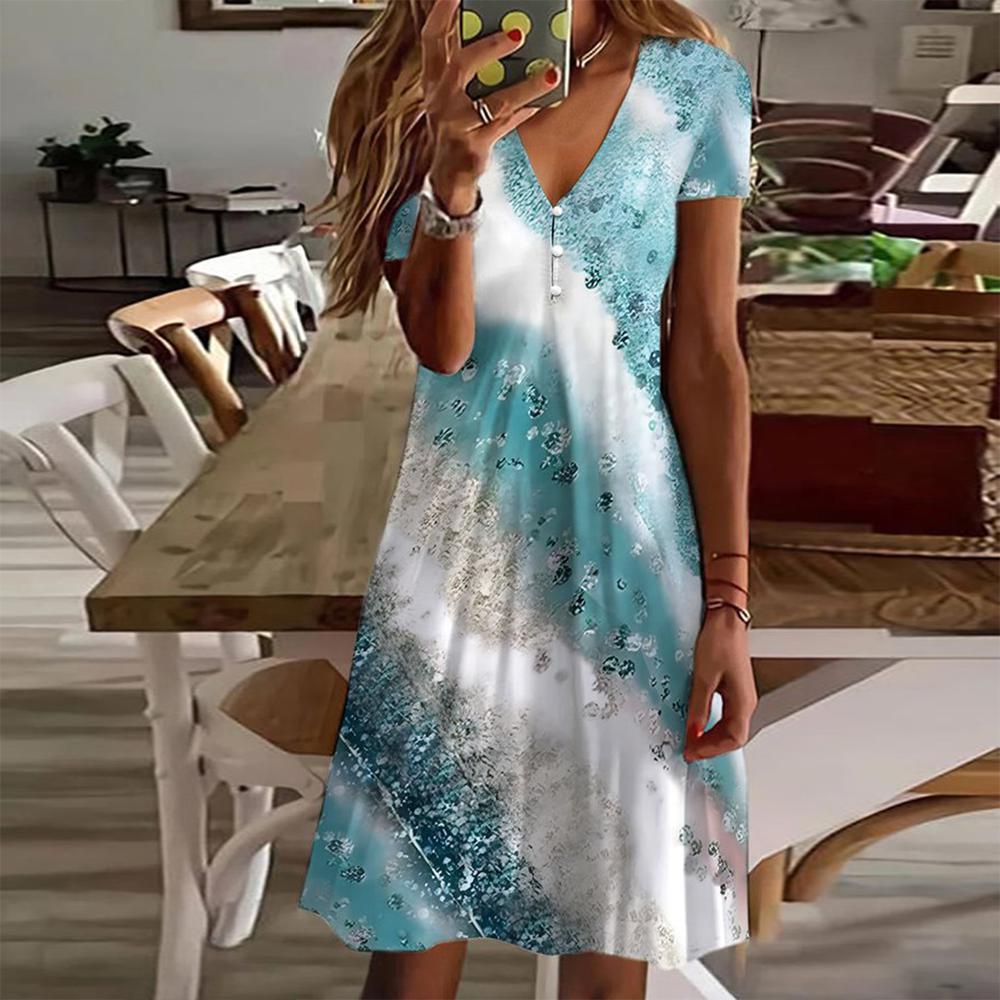 CM | Mini vestido azul estampado con mangas cortas