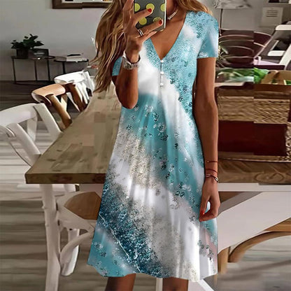 CM | Mini vestido azul estampado con mangas cortas
