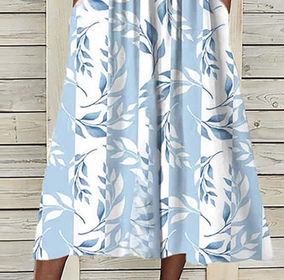CM | Vestido midi con estampado floral y chaqueta a juego