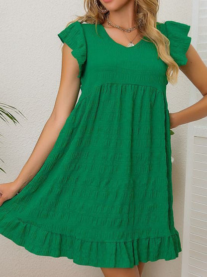 CM | Minivestido texturizado con volantes