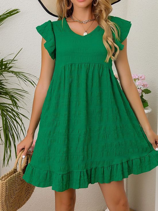 CM | Minivestido texturizado con volantes