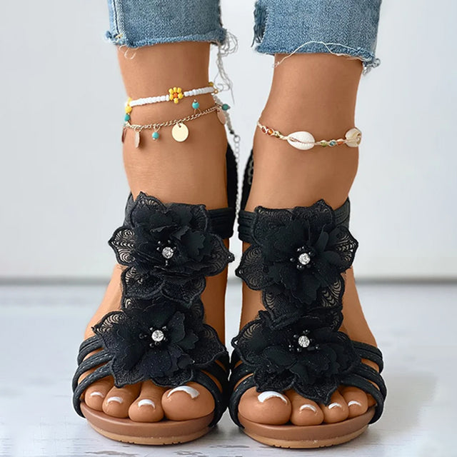 CM | Sandalias de cuña con adorno floral