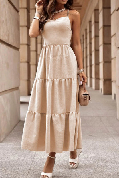 CM | Vestido cruzado en color avena con corpiño sin espalda y maxi vestido con capas