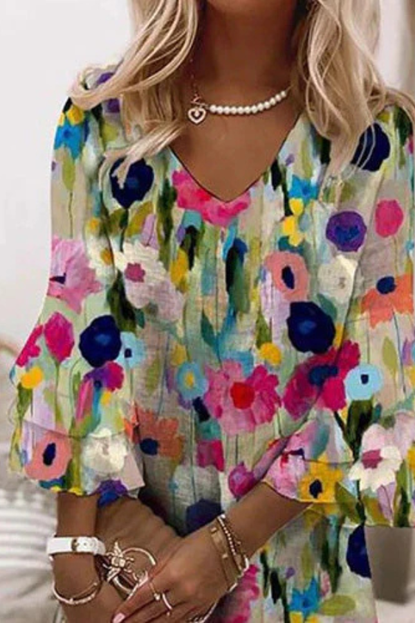 CM | Mini vestido romántico con estampado floral