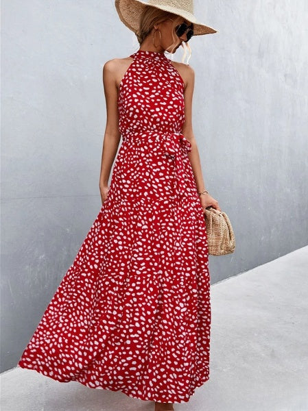 CM | Vestido mono de tirantes y escote halterneck con estampado de lunares ondulados