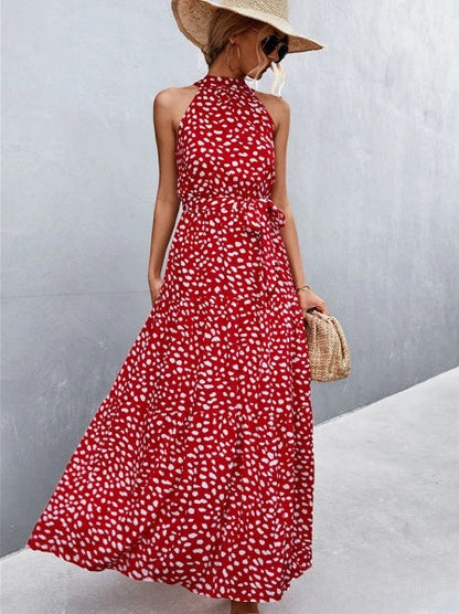 CM | Vestido mono de tirantes y escote halterneck con estampado de lunares ondulados